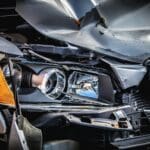silver and black car engine in accident